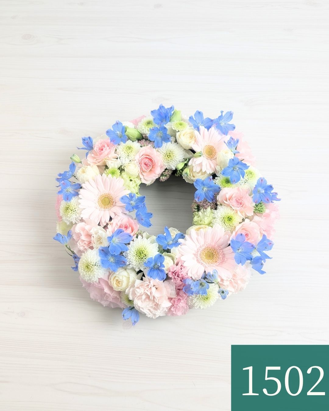 生花で贈るリース型アレンジメント。送って喜ばれるお花のギフト、フラワーギフト